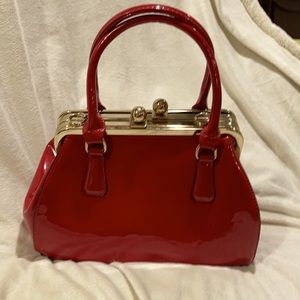 Bright red patent leather tote